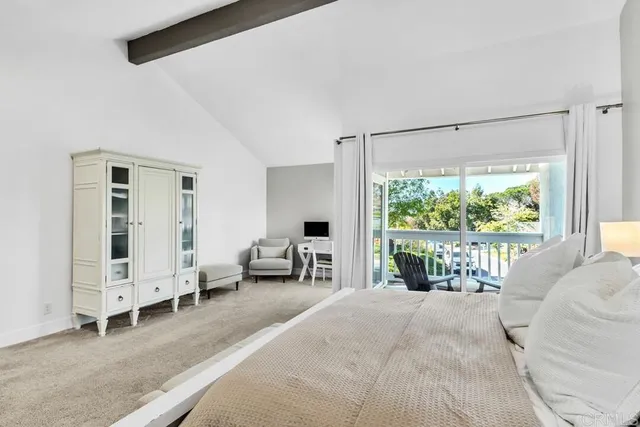 a room with a bed and a window