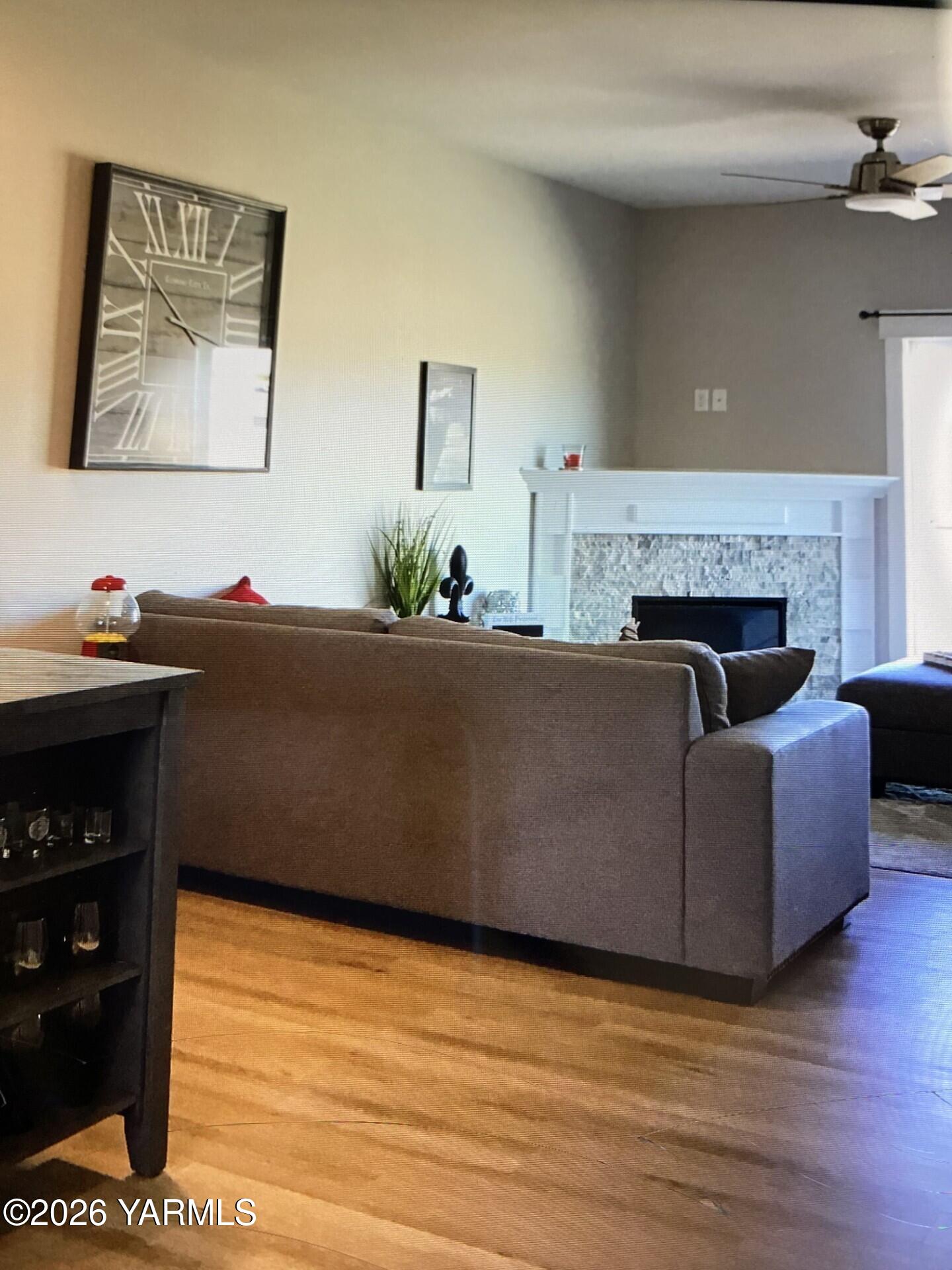 2600 Racquet Lane, Unit 36 Yakima, WA 98902 - Photo 3 of 5 a living room with furniture and a fireplace