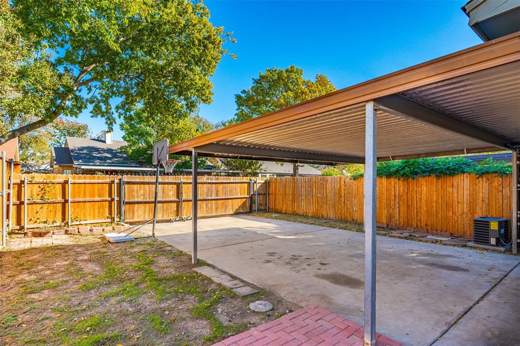 2906 Roxboro Road Euless, TX 76039 - Photo 19 of 23 a view of a backyard