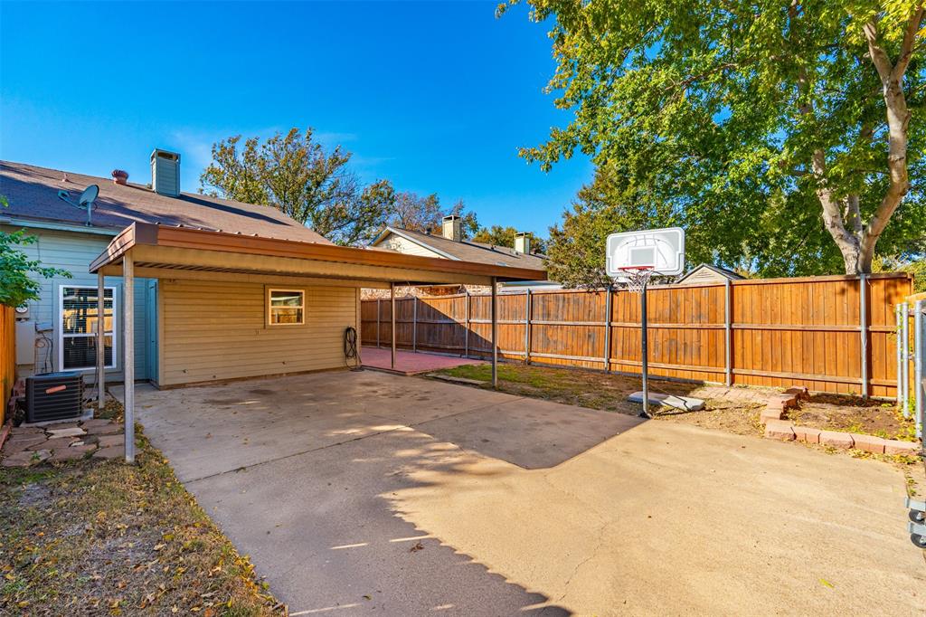 2906 Roxboro Road Euless, TX 76039 - Photo 21 of 23 a view of a backyard