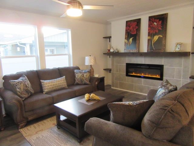 222 Holly Berry Way Fruita, CO 81521 - Photo 11 of 23 a living room with furniture and a fireplace