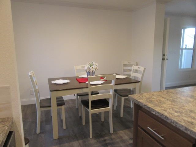 222 Holly Berry Way Fruita, CO 81521 - Photo 17 of 23 a view of a dining room with furniture