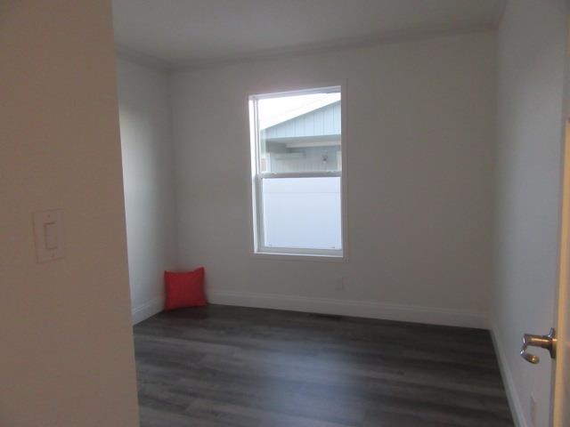 222 Holly Berry Way Fruita, CO 81521 - Photo 20 of 23 a view of wooden floor and window in a room