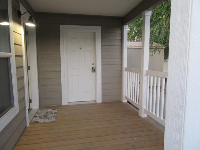 222 Holly Berry Way Fruita, CO 81521 - Photo 4 of 23 a view of a wooden door