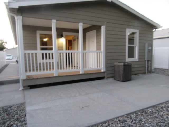 222 Holly Berry Way Fruita, CO 81521 - Photo 5 of 23 a view of a house with porch and wooden fence