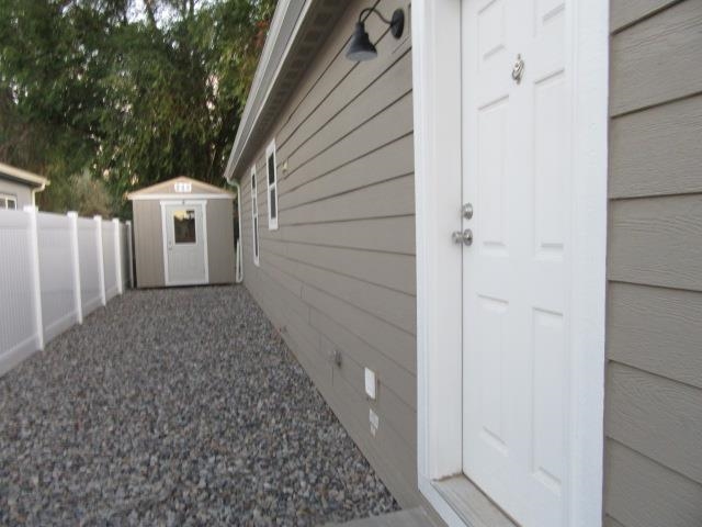 222 Holly Berry Way Fruita, CO 81521 - Photo 6 of 23 a view of a house with a backyard