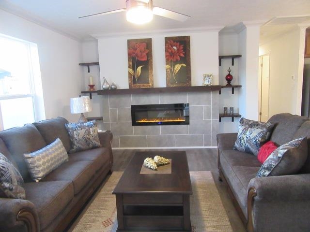 222 Holly Berry Way Fruita, CO 81521 - Photo 9 of 23 a living room with furniture and a fireplace