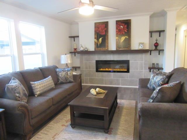 222 Holly Berry Way Fruita, CO 81521 - Photo 10 of 23 a living room with furniture and a fireplace
