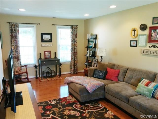 2528 London Road Henrico, VA 23233 - Photo 3 of 10 a living room with furniture and a fireplace