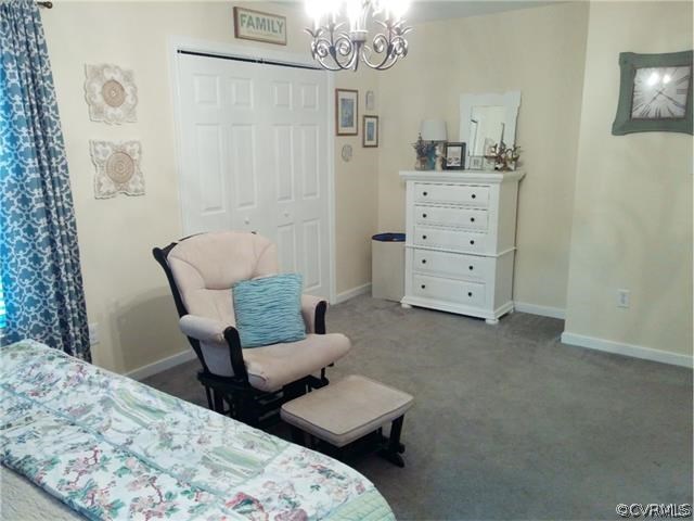 2528 London Road Henrico, VA 23233 - Photo 9 of 10 a bedroom with a bed and furniture