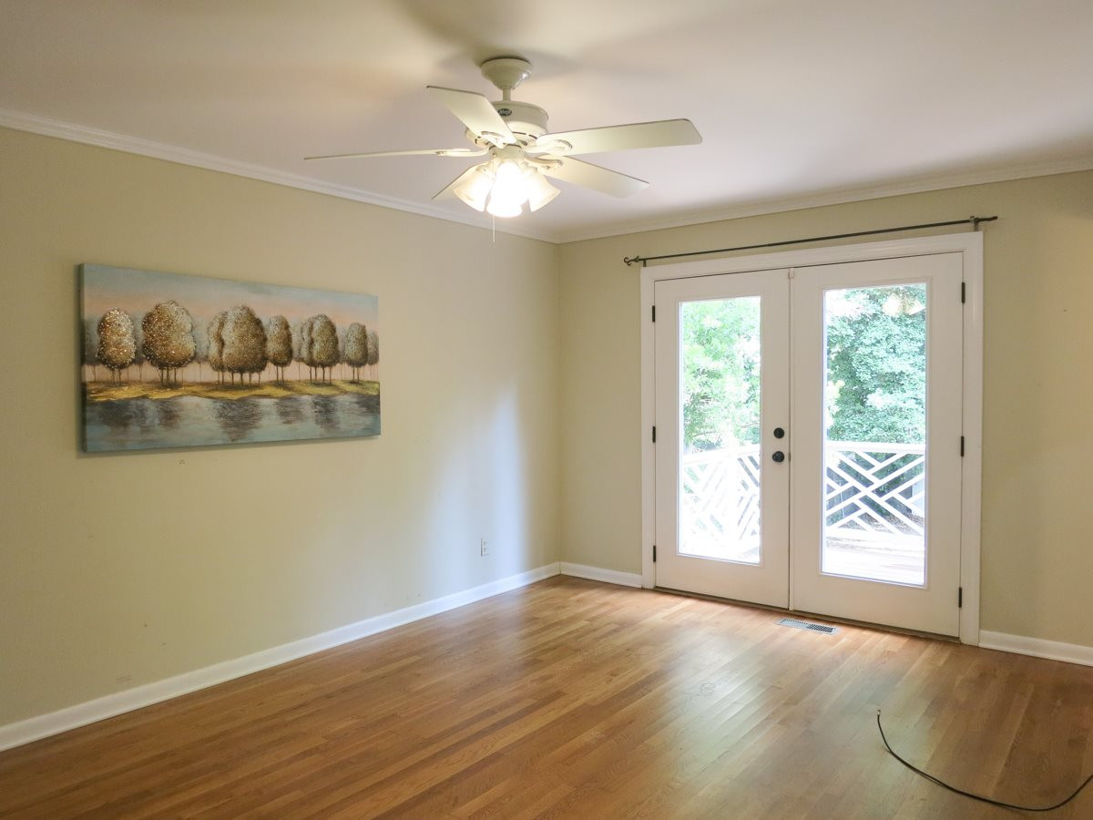 704 Currituck Drive Raleigh, NC 27609 - Photo 13 of 25 The spacious & very private Master Bedroom features hardwood floor, lg fitted WIC, CF, French drs to the Deck & updated Bath. Master Bedroom