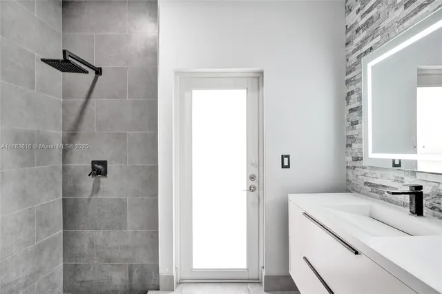 a lawn chairs sitting in backyard of a house