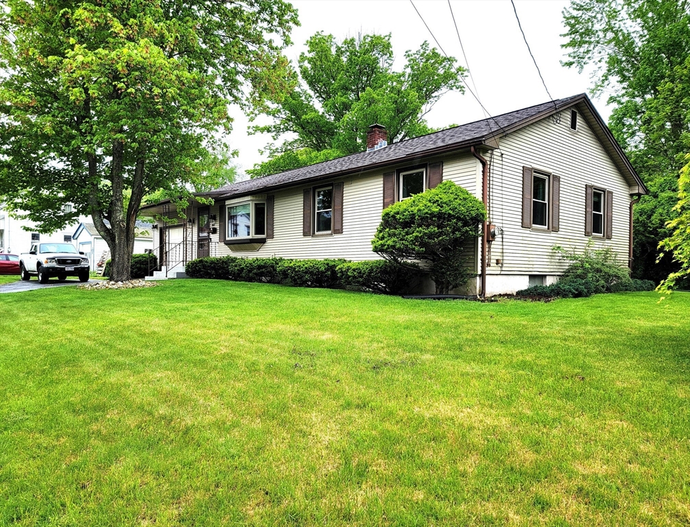2022 Quaboag Street Three Rivers, MA 01080 - Photo 1 of 16 a view of a house with backyard