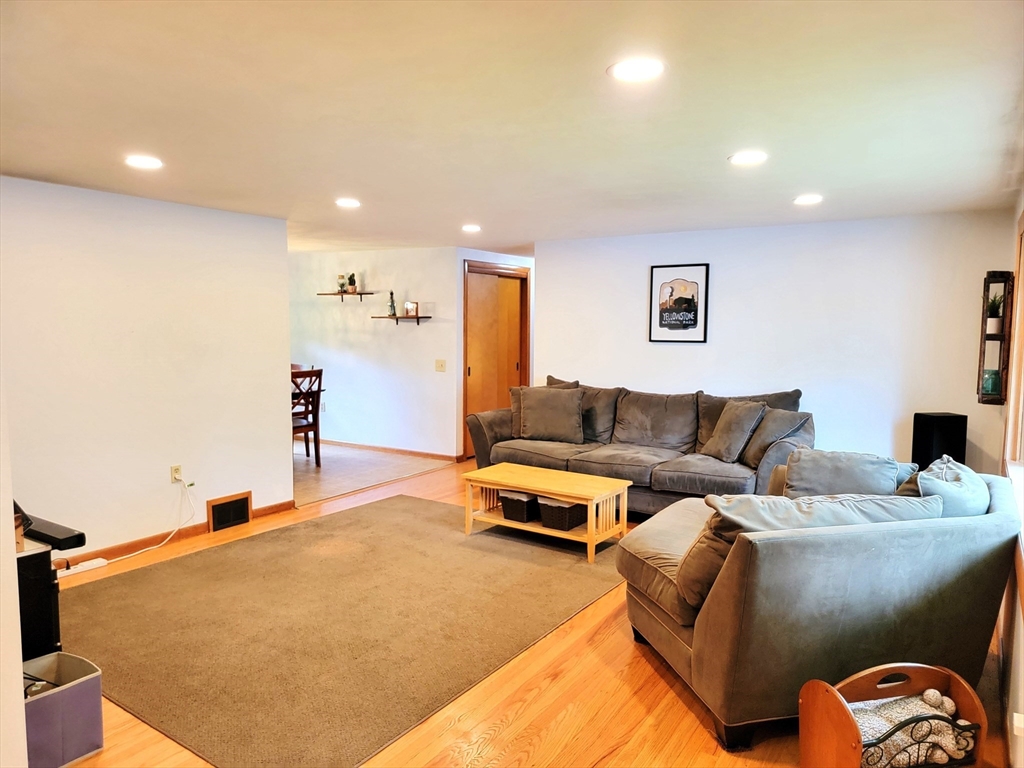 2022 Quaboag Street Three Rivers, MA 01080 - Photo 3 of 16 a living room with furniture and a couch