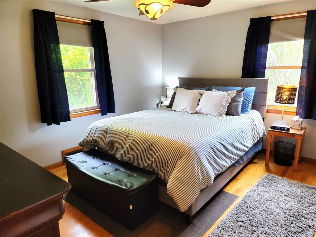 2022 Quaboag Street Three Rivers, MA 01080 - Photo 8 of 16 a bedroom with a bed and a window