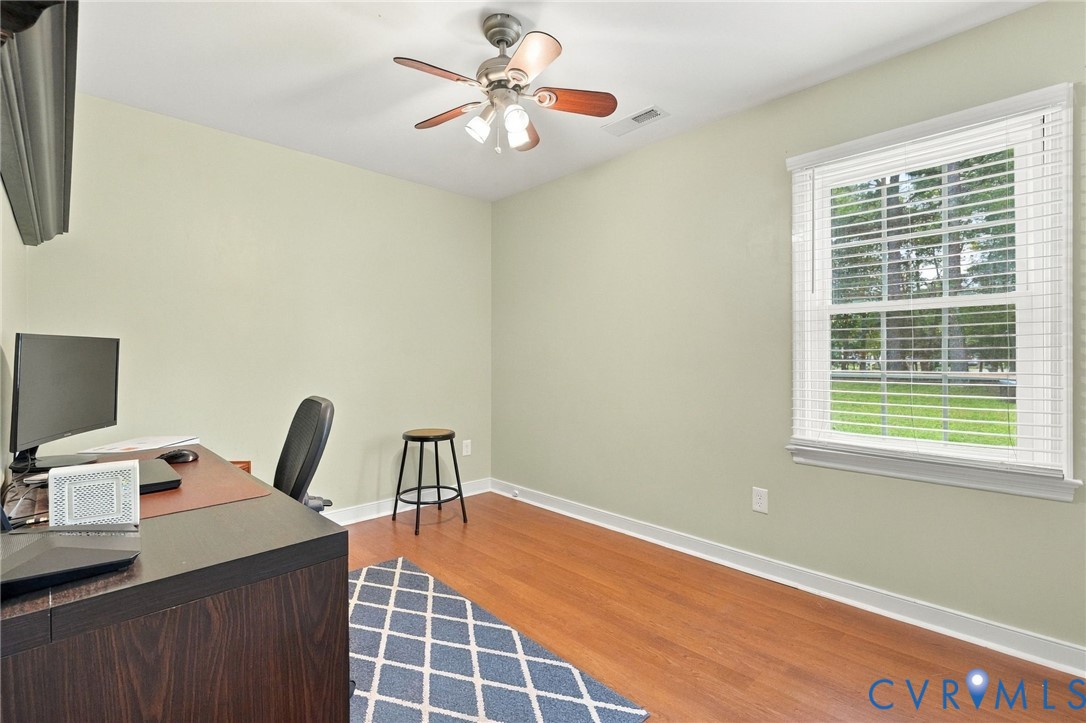 194 Poplar Road Aylett, VA 23009 - Photo 22 of 48 Hardwood flooring, light green walls, ceiling fan
