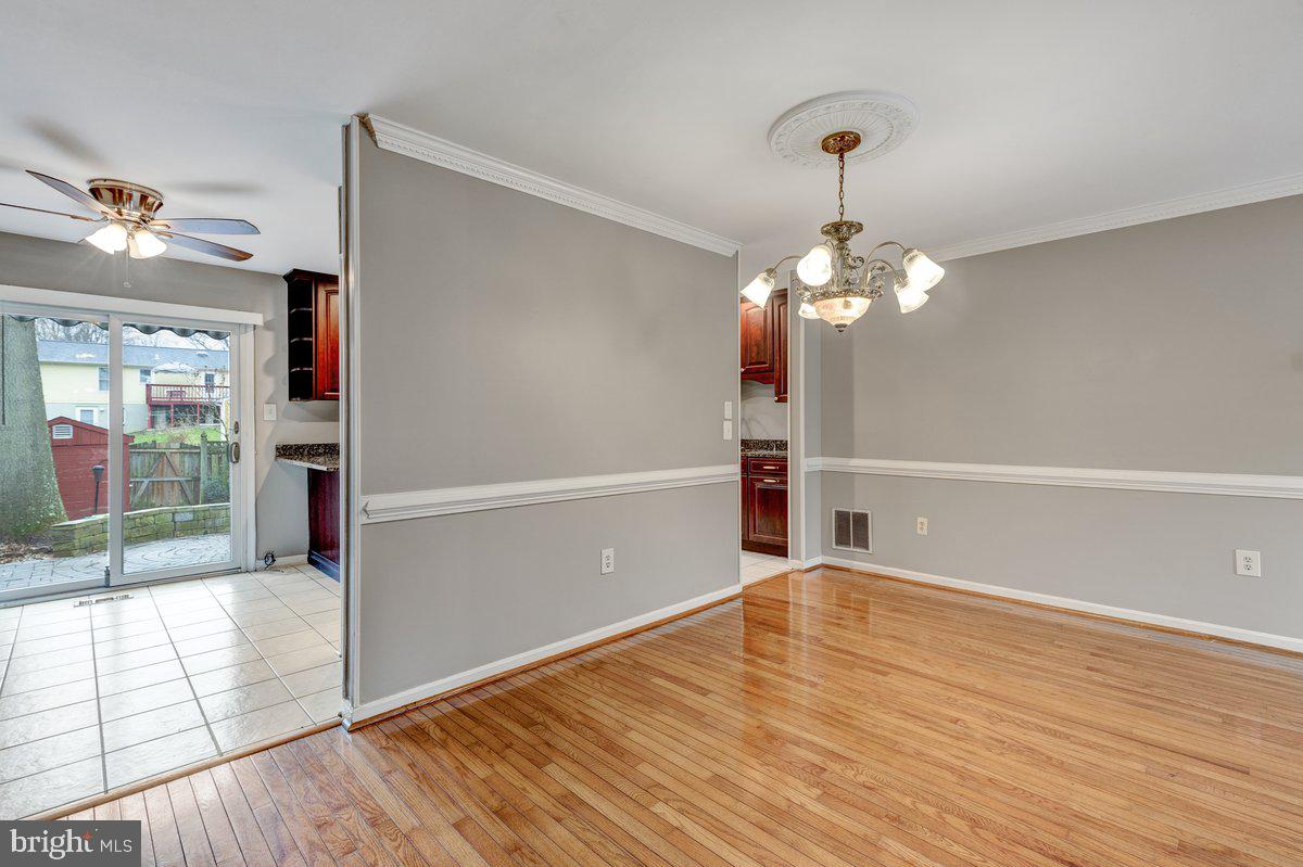 14216 Catamount Court Silver Spring, MD 20906 - Photo 25 of 30 wooden floor in an empty room with a window