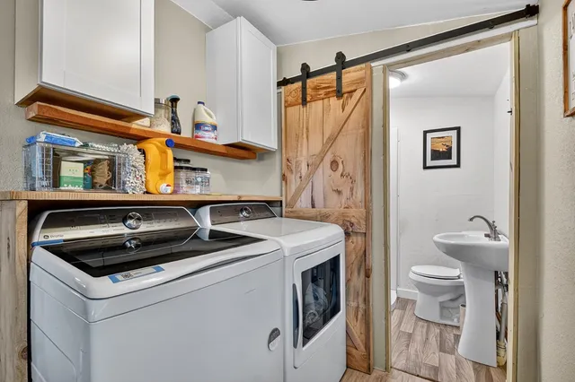 a utility room with dryer and washer