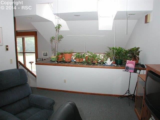 18105 Forest View Road Monument, CO 80132 - Photo 16 of 24 View from Loft/Office toward Overlook to Kitchen & Great Room!