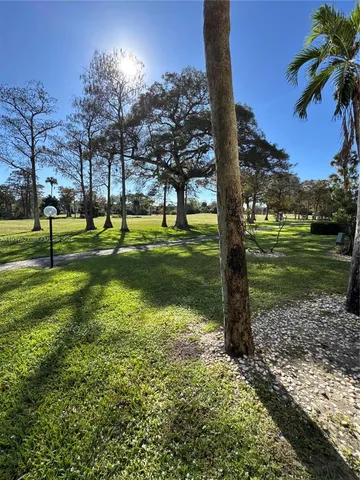 a view of a back yard of the house