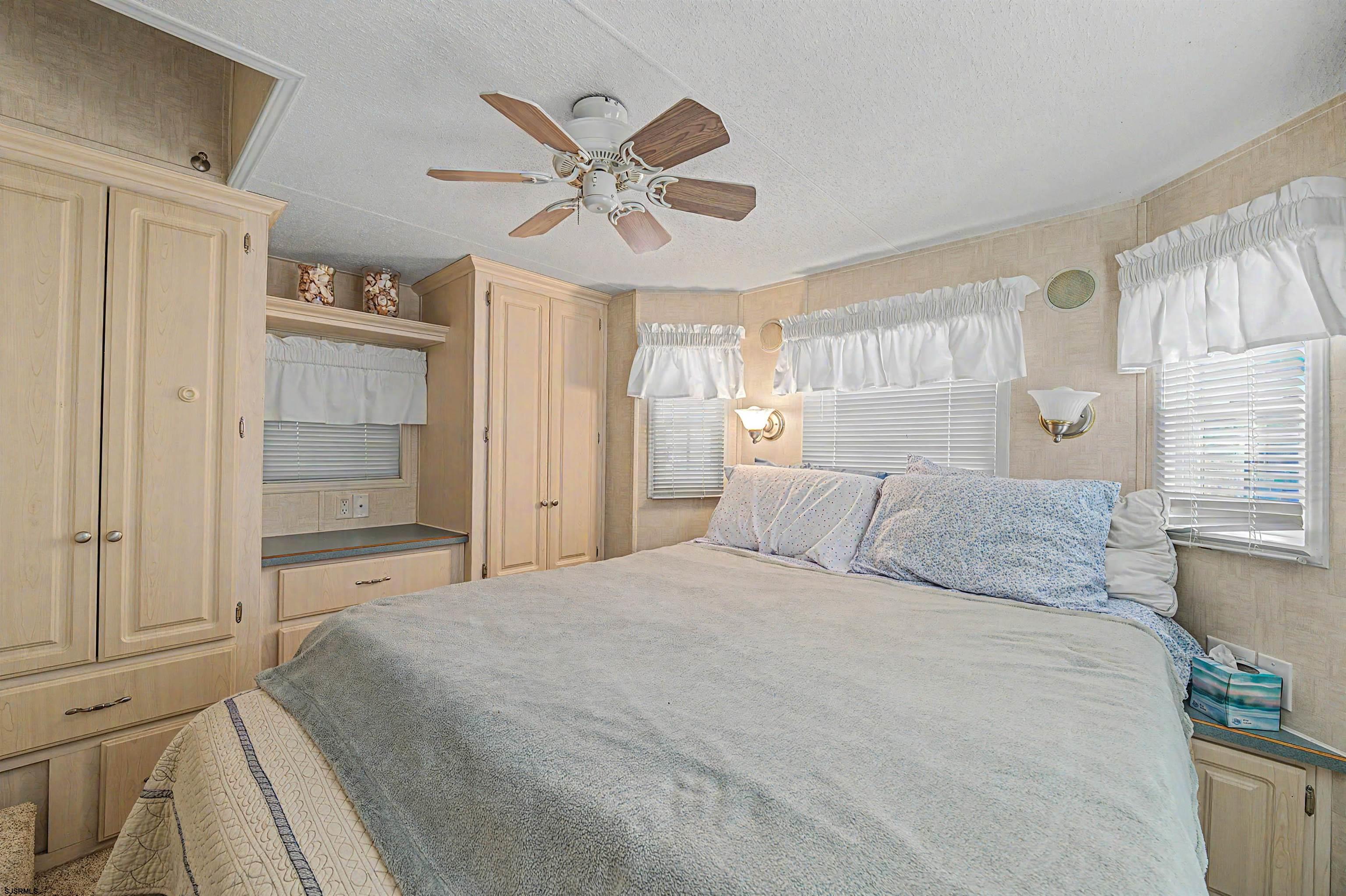 3066 Route 9 Ocean View, NJ 08230 - Photo 18 of 29 a bedroom with a large bed and closet