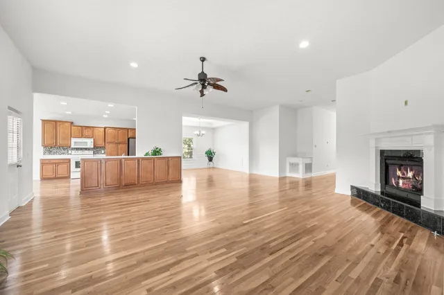 a stove top oven sitting inside of a kitchen