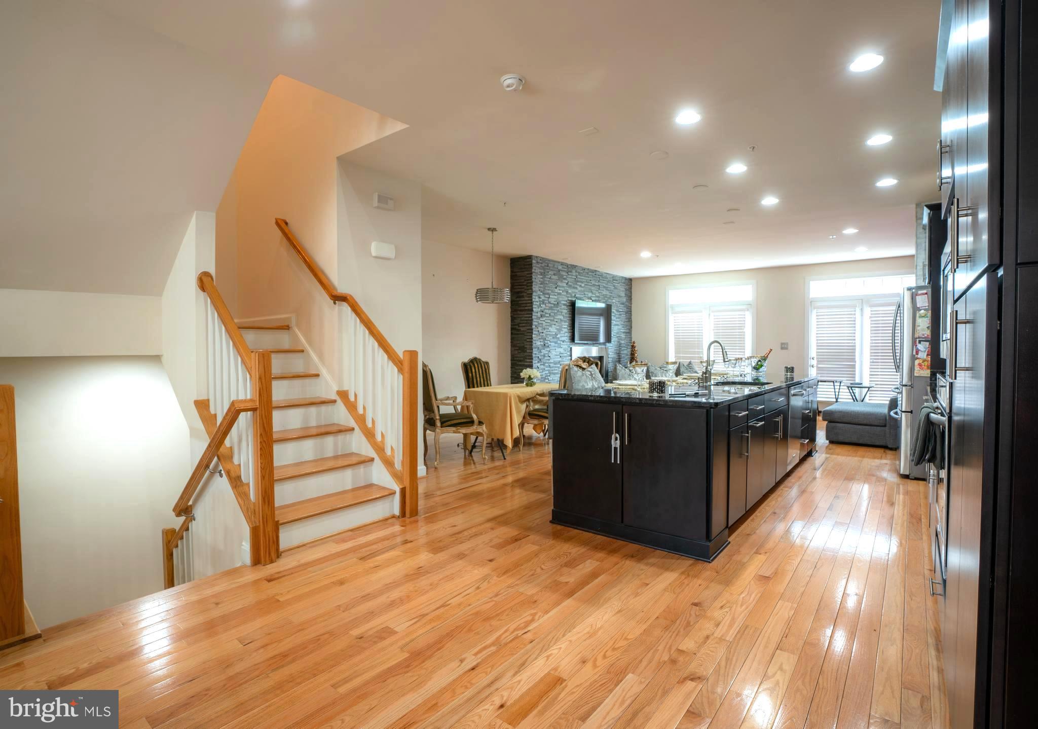 7447 Burnside Way Hanover, MD 21076 - Photo 19 of 19 Open Floor Plan Living Room Dining Room & Kitchen