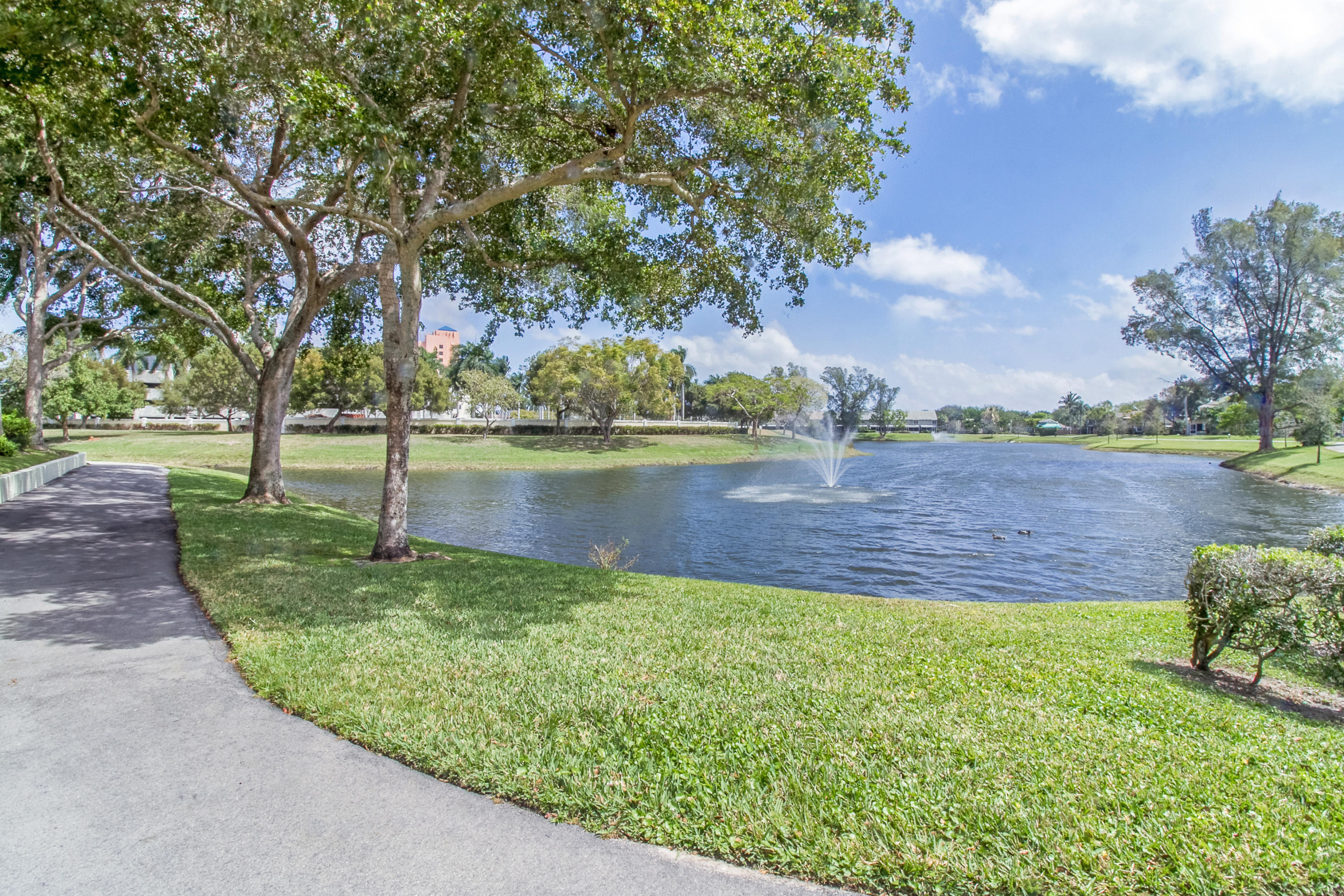 5223 Sapphire Valley Boca Raton, FL 33431 - Photo 3 of 34 a view of a lake with a big yard