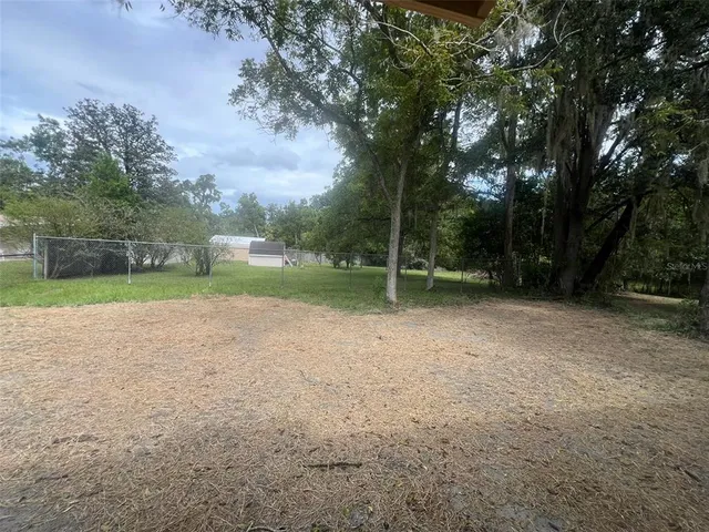 a view of outdoor space and yard