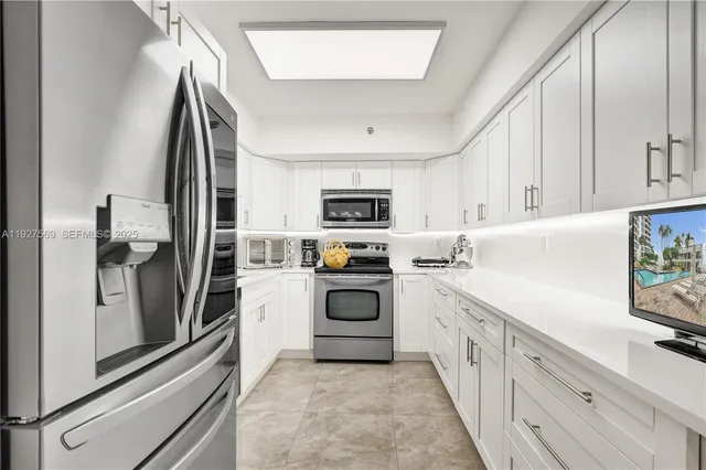 $375,000 | 3600 Mystic Pointe Drive, Unit 311, Aventura, FL 33180