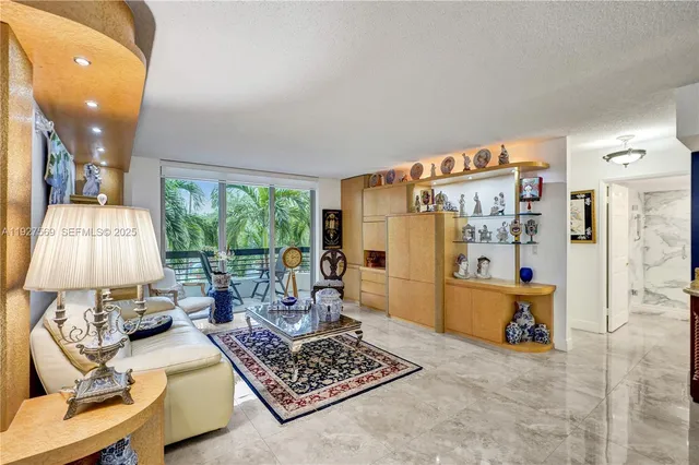 $375,000 | 3600 Mystic Pointe Drive, Unit 311, Aventura, FL 33180