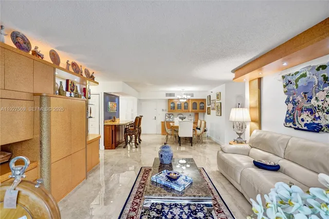 $375,000 | 3600 Mystic Pointe Drive, Unit 311, Aventura, FL 33180