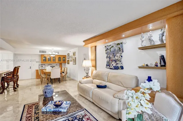 $375,000 | 3600 Mystic Pointe Drive, Unit 311, Aventura, FL 33180