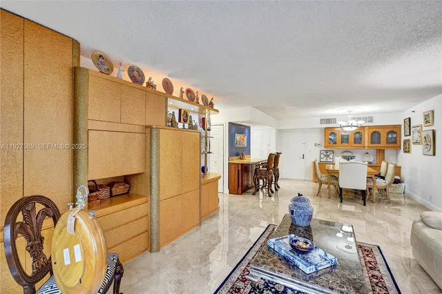 $375,000 | 3600 Mystic Pointe Drive, Unit 311, Aventura, FL 33180