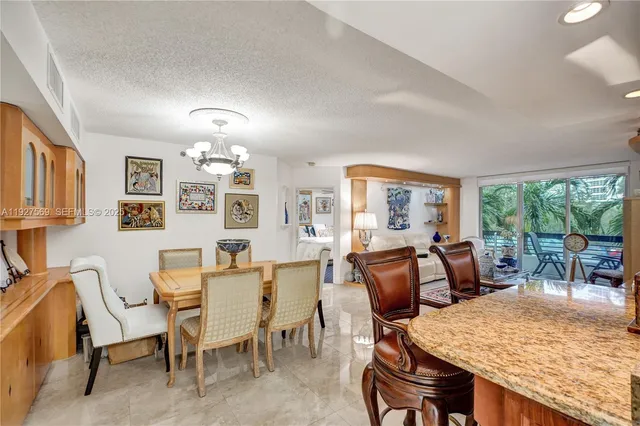 $375,000 | 3600 Mystic Pointe Drive, Unit 311, Aventura, FL 33180