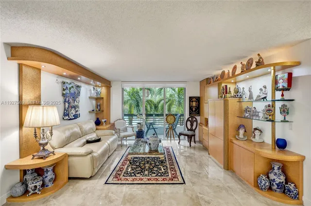 $375,000 | 3600 Mystic Pointe Drive, Unit 311, Aventura, FL 33180