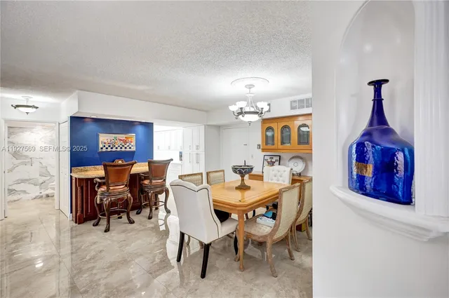 $375,000 | 3600 Mystic Pointe Drive, Unit 311, Aventura, FL 33180