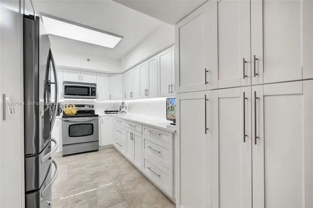 $375,000 | 3600 Mystic Pointe Drive, Unit 311, Aventura, FL 33180