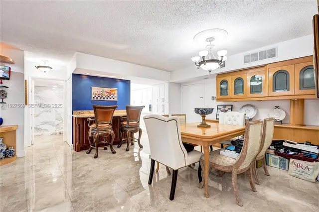 $375,000 | 3600 Mystic Pointe Drive, Unit 311, Aventura, FL 33180