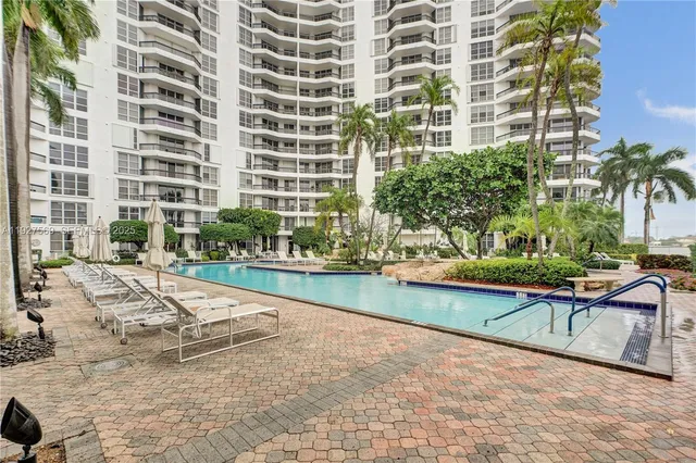 $375,000 | 3600 Mystic Pointe Drive, Unit 311, Aventura, FL 33180
