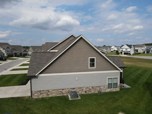 a view of a house with a yard