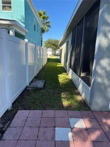 a view of backyard with seating space
