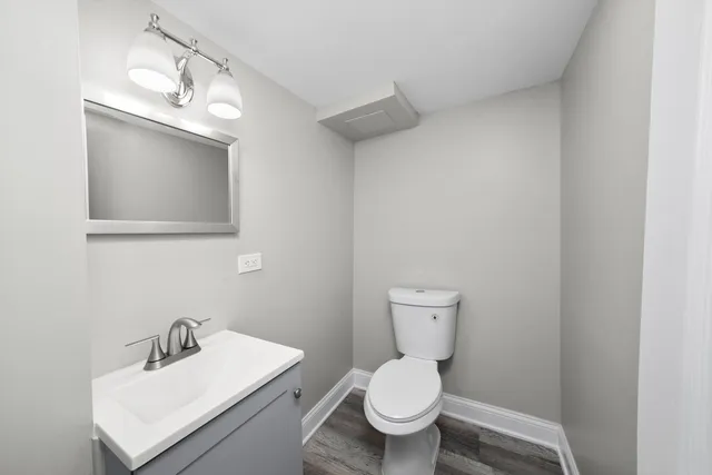 a view of a balcony with wooden floor