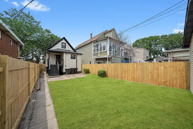 a house view with a garden space