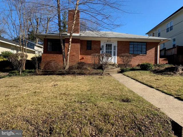 a front view of a house with garage