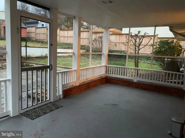 a view of a porch with backyard of the house
