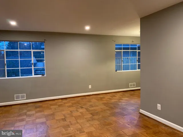 an empty room with windows