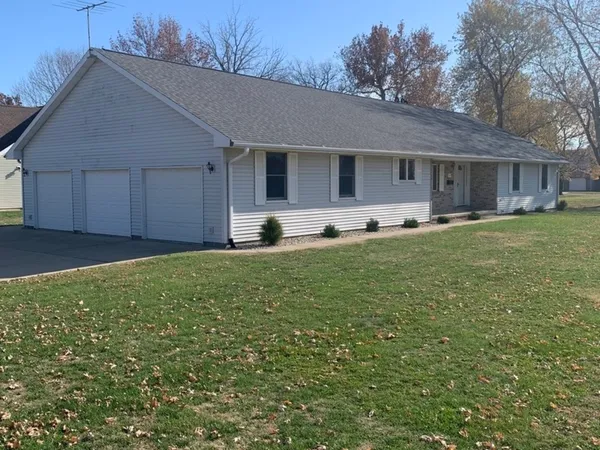 a house view with a garden space