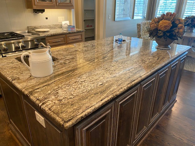 7233 Standing Boy Road Columbus, GA 31904 - Photo 16 of 67 a kitchen with granite countertop a sink a counter top space and cabinets