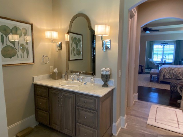 7233 Standing Boy Road Columbus, GA 31904 - Photo 26 of 67 a en suite bathroom with a sink and a mirror